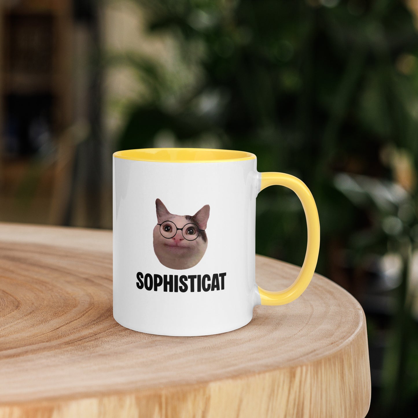 White ceramic mug with color inside featuring Beluga cat wearing glasses and "SOPHISTICAT" text