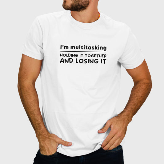 I m multitasking holding it together and losing it. Unisex t-shirt