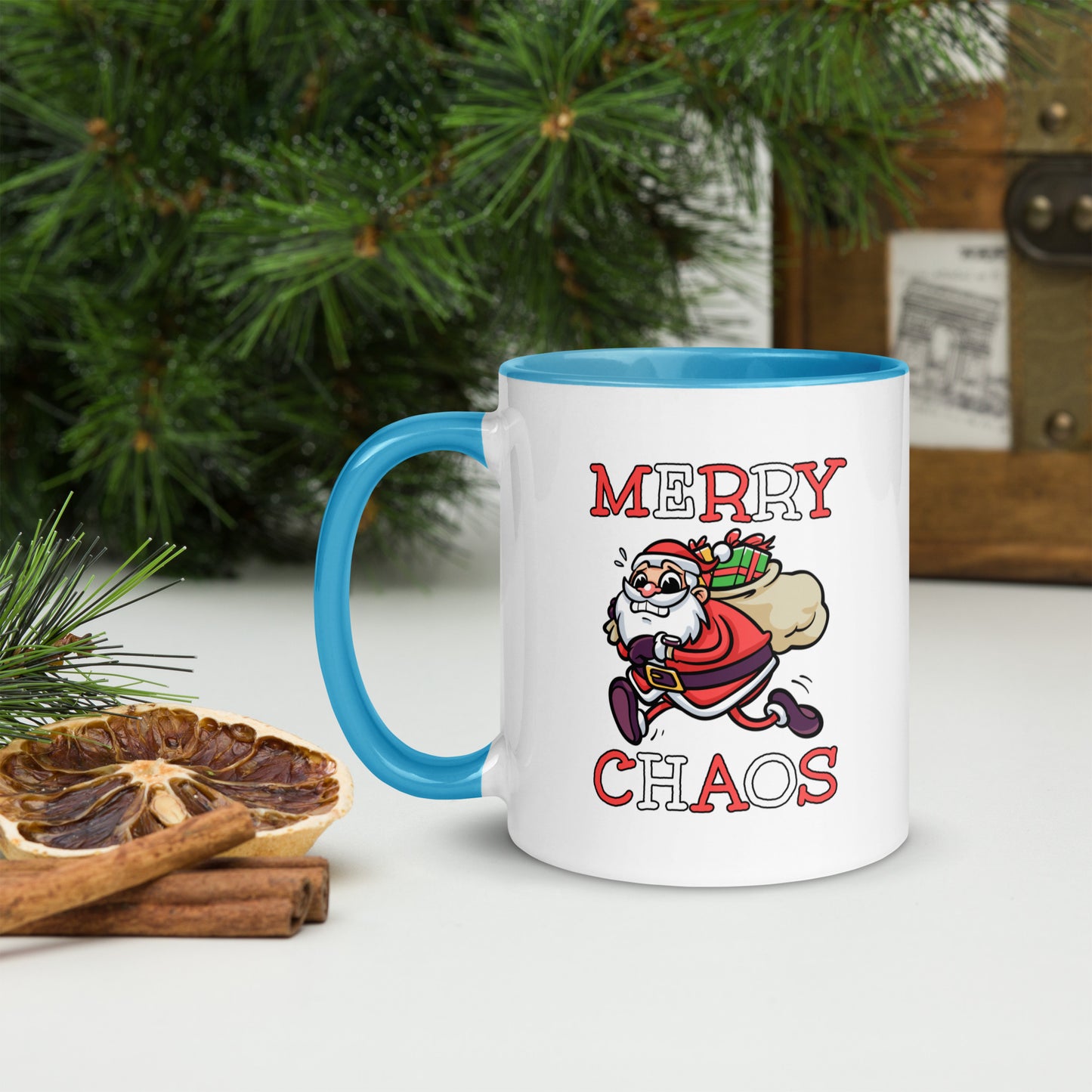 White ceramic mug with color inside featuring funny running Santa Claus and "MERRY CHAOS" text
