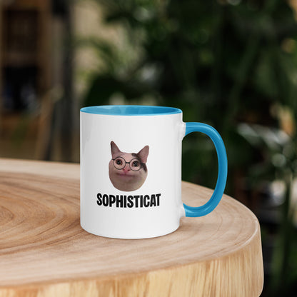 White ceramic mug with color inside featuring Beluga cat wearing glasses and "SOPHISTICAT" text