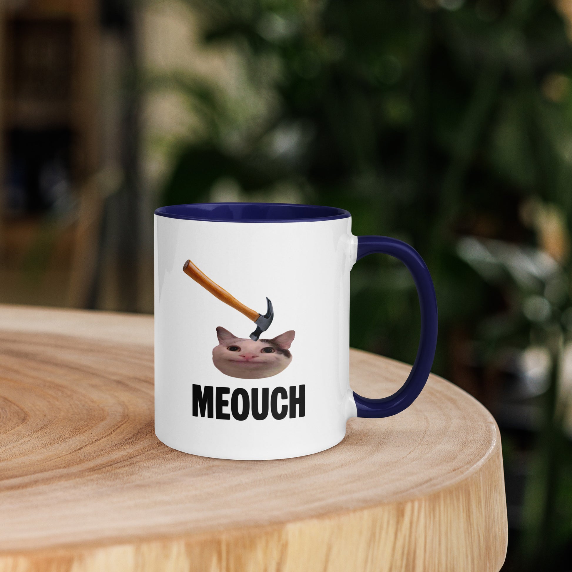 White ceramic mug with Color inside featuring funny Meouch cat meme and hammer design