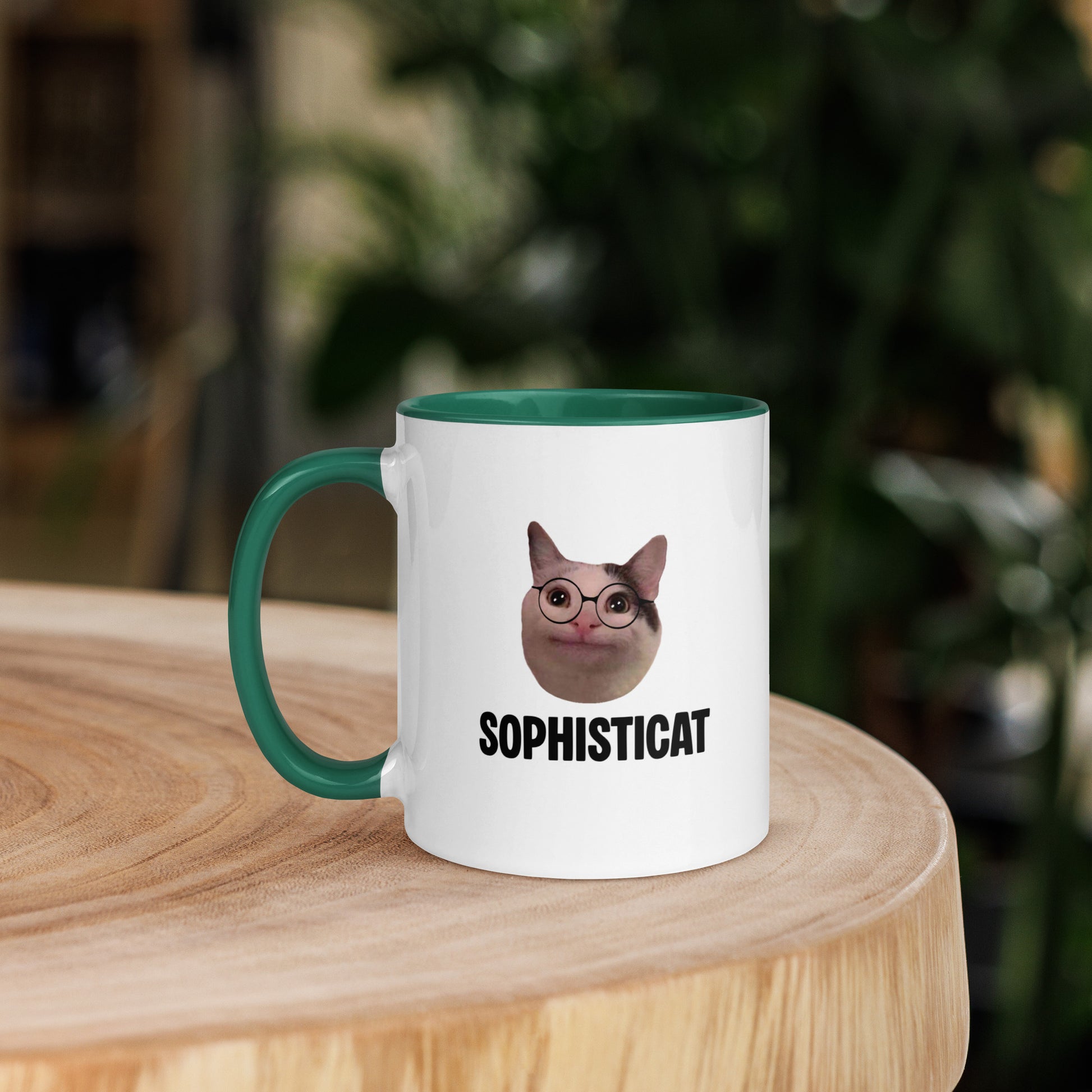 White ceramic mug with color inside featuring Beluga cat wearing glasses and "SOPHISTICAT" text