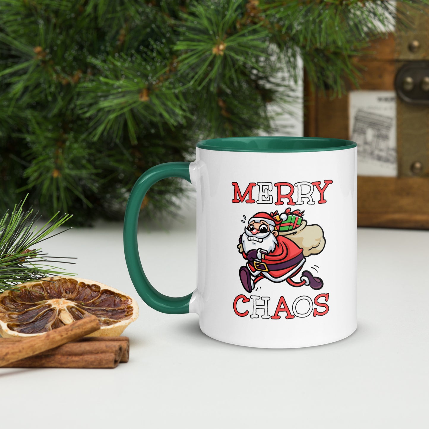White ceramic mug with color inside featuring funny running Santa Claus and "MERRY CHAOS" text