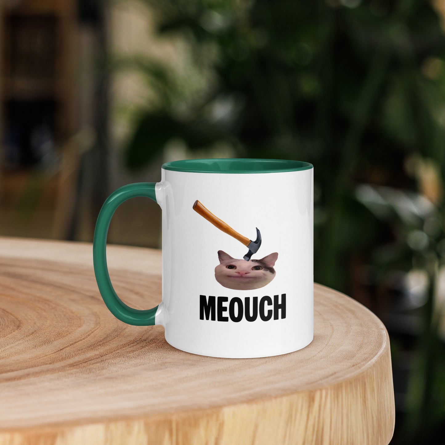 White ceramic mug with Color inside featuring funny Meouch cat meme and hammer design