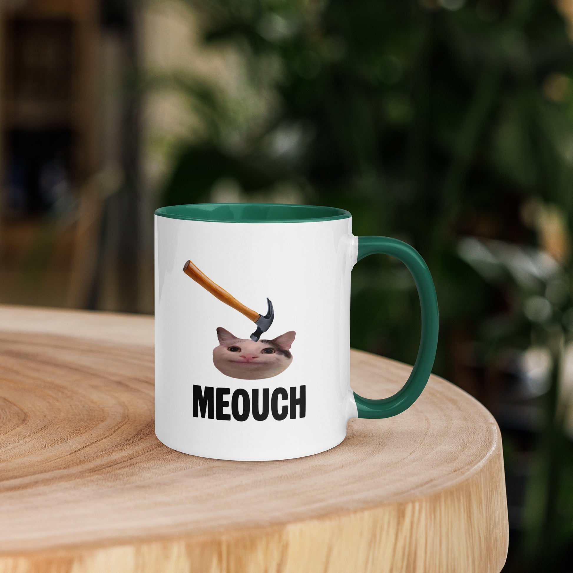 White ceramic mug with Color inside featuring funny Meouch cat meme and hammer design