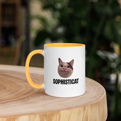 White ceramic mug with color inside featuring Beluga cat wearing glasses and "SOPHISTICAT" text
