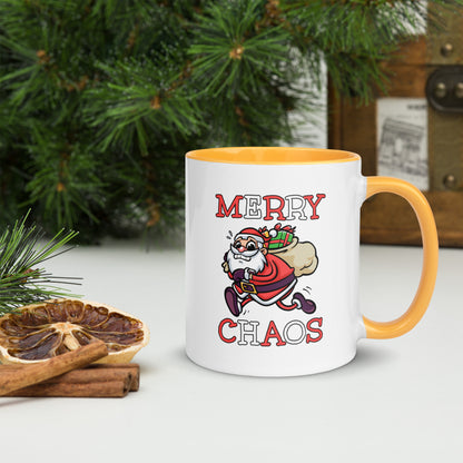 White ceramic mug with color inside featuring funny running Santa Claus and "MERRY CHAOS" text