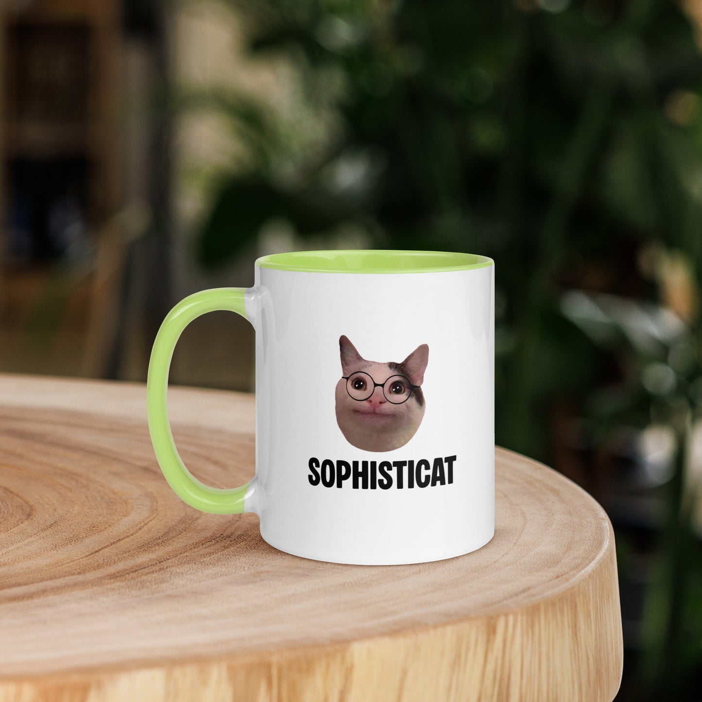 White ceramic mug with color inside featuring Beluga cat wearing glasses and "SOPHISTICAT" text