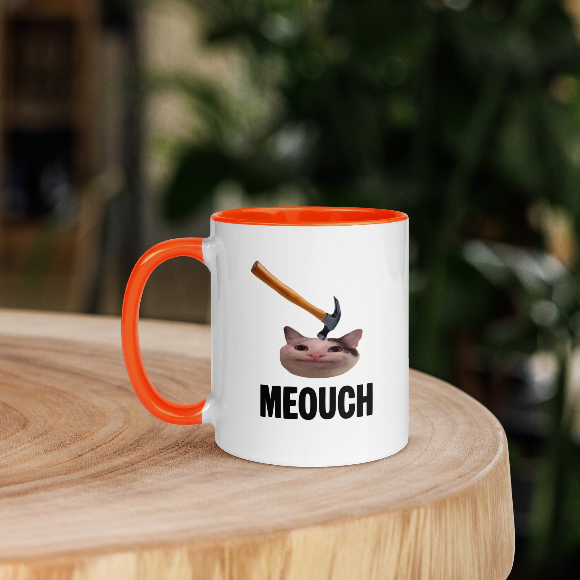 White ceramic mug with Color inside featuring funny Meouch cat meme and hammer design