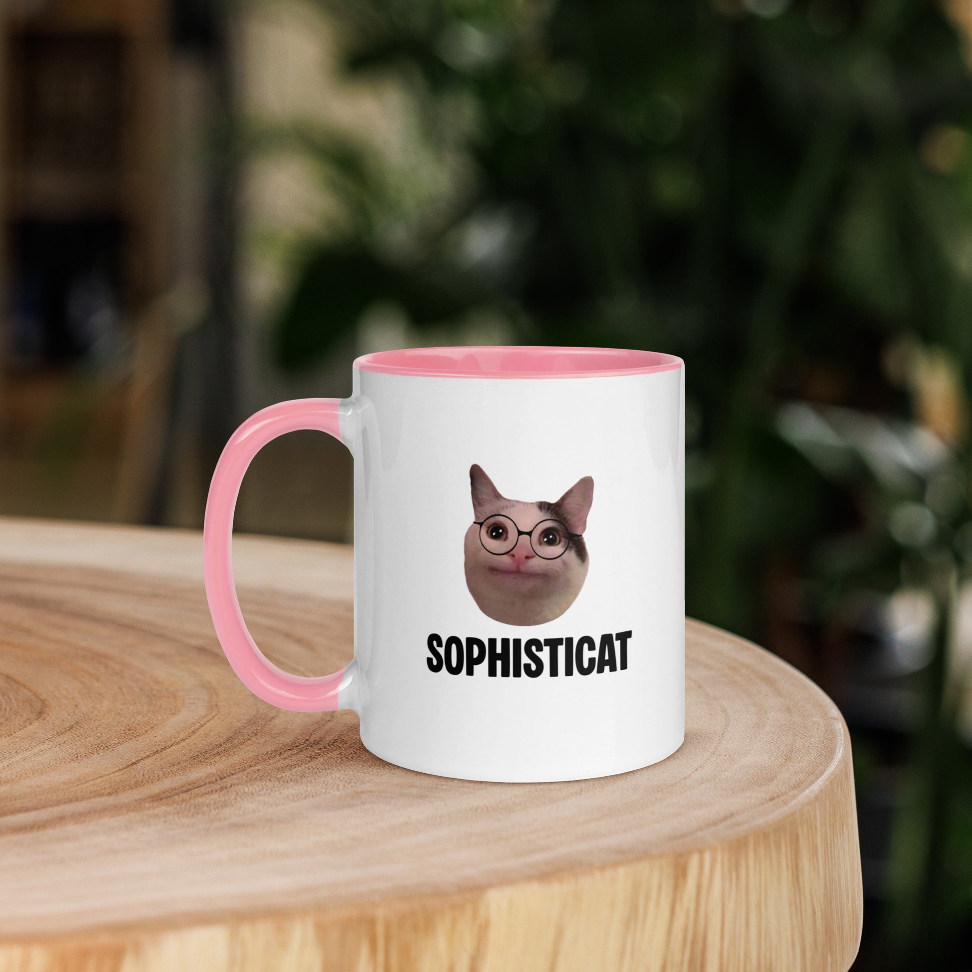 White ceramic mug with color inside featuring Beluga cat wearing glasses and "SOPHISTICAT" text