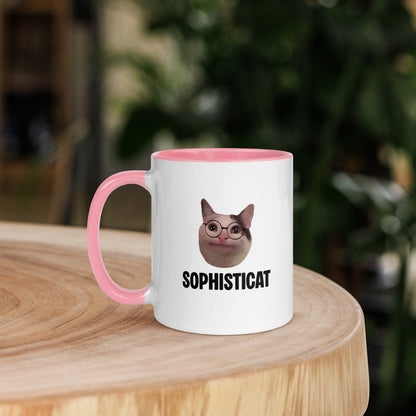 White ceramic mug with color inside featuring Beluga cat wearing glasses and "SOPHISTICAT" text