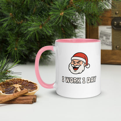 White ceramic mug with color inside featuring winking Santa Claus face and "I WORK 1 DAY" text