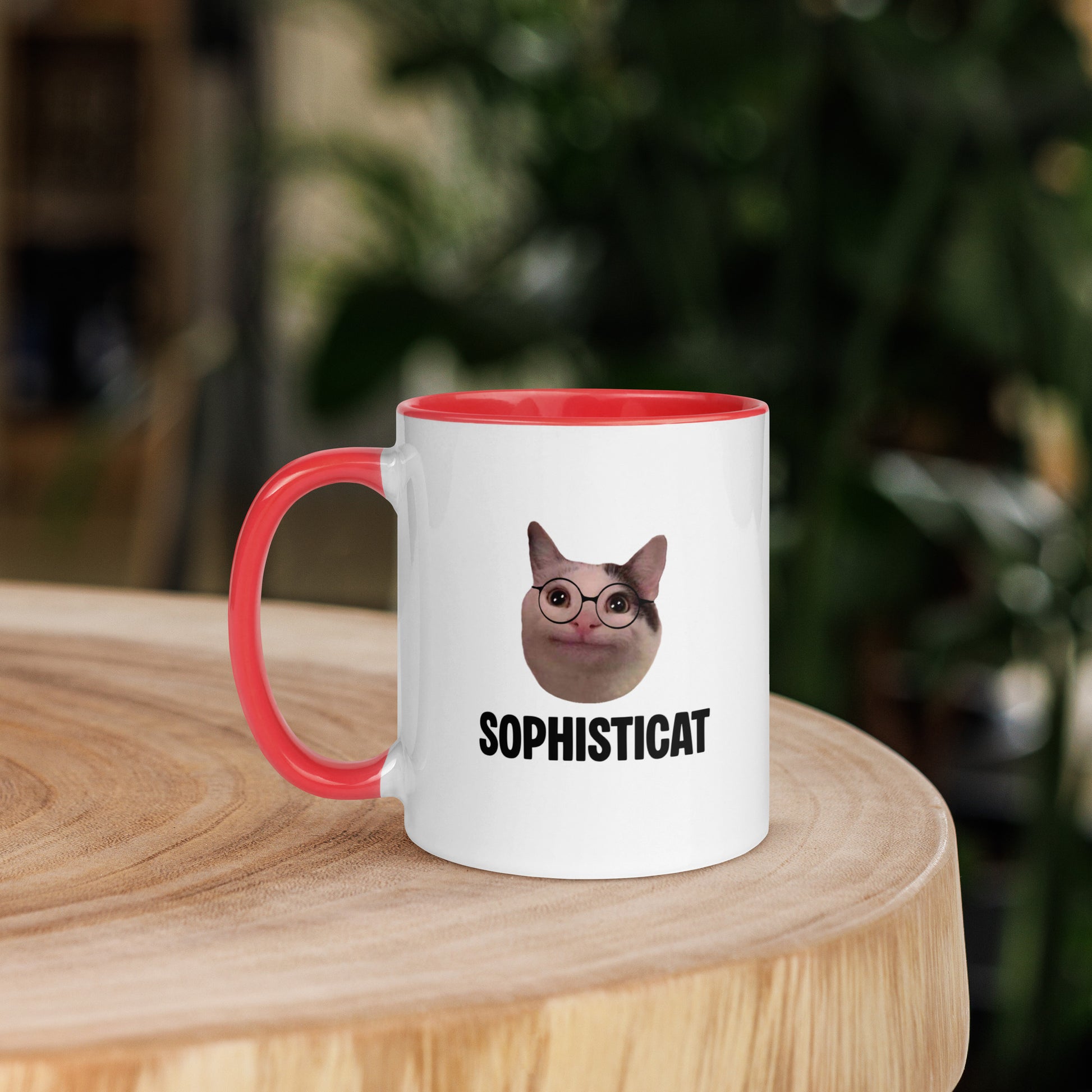 White ceramic mug with color inside featuring Beluga cat wearing glasses and "SOPHISTICAT" text