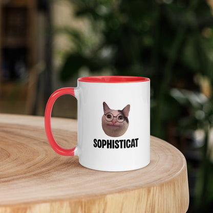 White ceramic mug with color inside featuring Beluga cat wearing glasses and "SOPHISTICAT" text