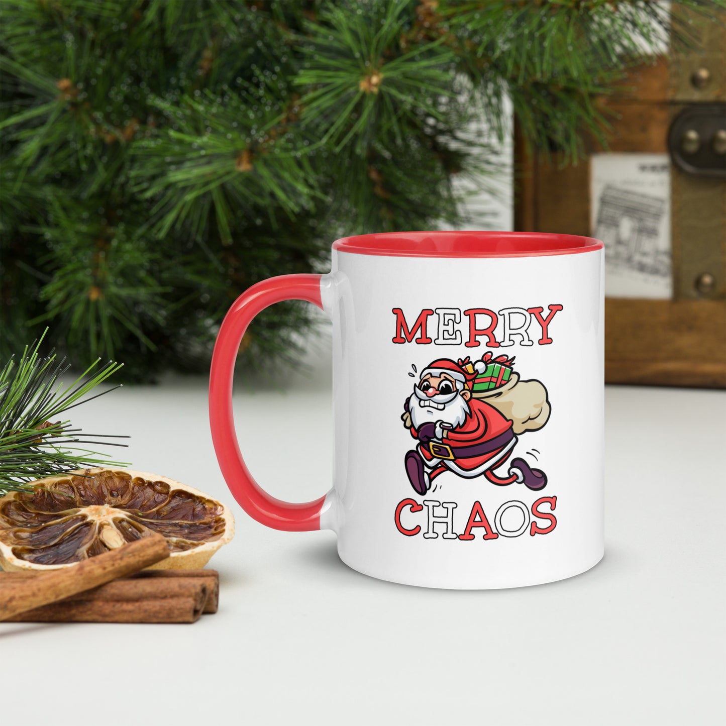 White ceramic mug with color inside featuring funny running Santa Claus and "MERRY CHAOS" text