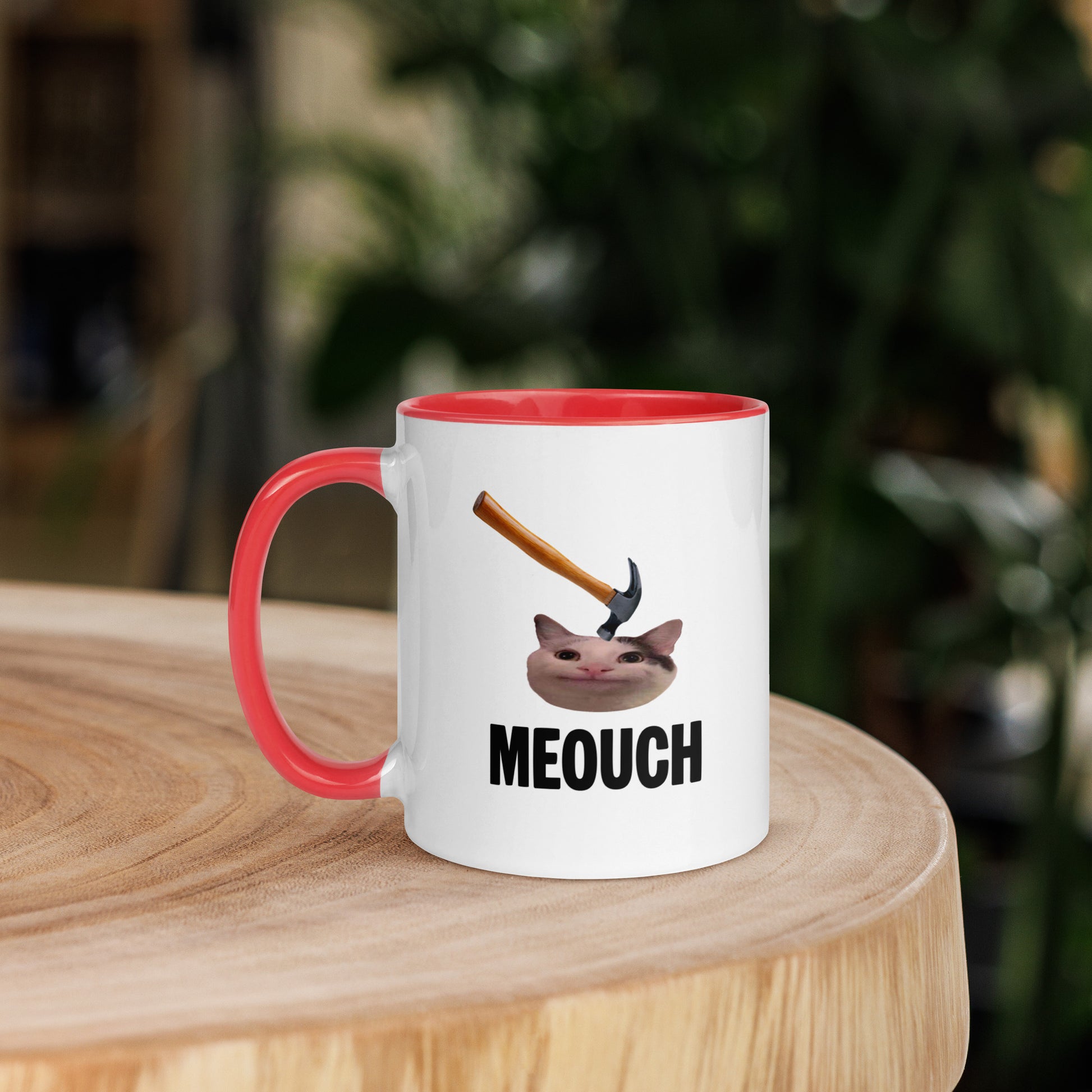 White ceramic mug with Color inside featuring funny Meouch cat meme and hammer design