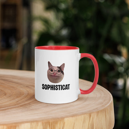 White ceramic mug with color inside featuring Beluga cat wearing glasses and "SOPHISTICAT" text