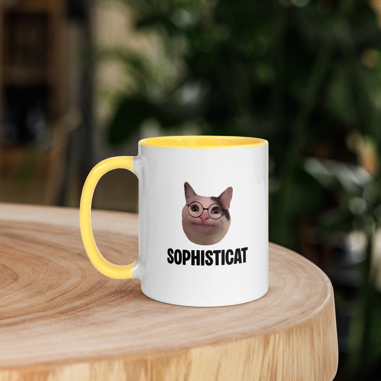 White ceramic mug with color inside featuring Beluga cat wearing glasses and "SOPHISTICAT" text