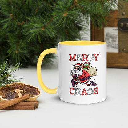 White ceramic mug with color inside featuring funny running Santa Claus and "MERRY CHAOS" text