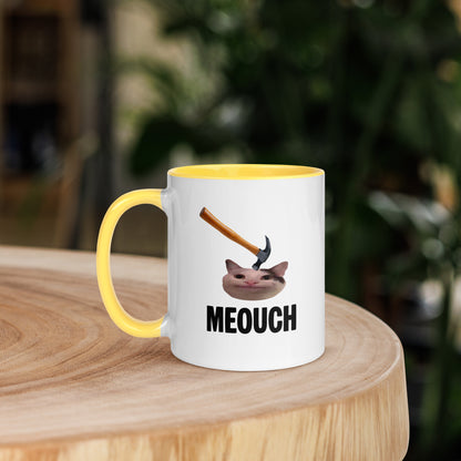 White ceramic mug with Color inside featuring funny Meouch cat meme and hammer design